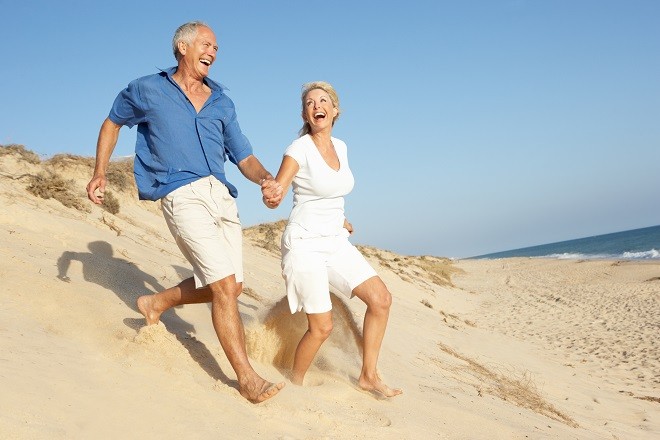 Couple running on beach Couple running on beach